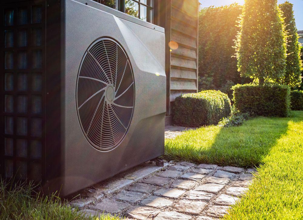 Generic black heat pump in garden
